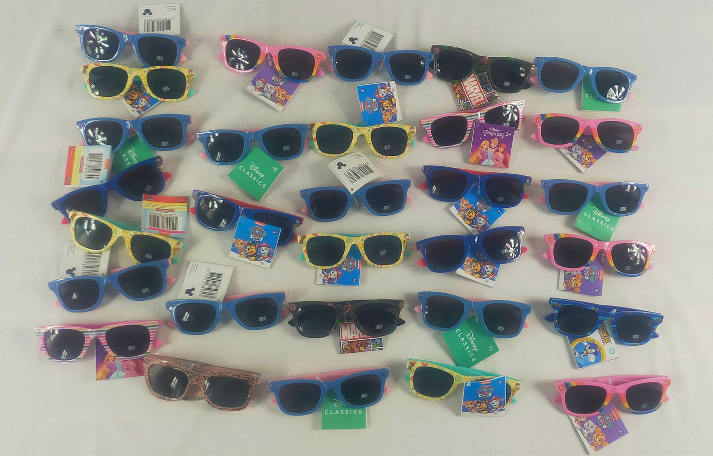 Lot de 30 Paires de lunettes de soleil enfant Disney Paw Patrol / Princesse ...( 1 euro / pcs )
