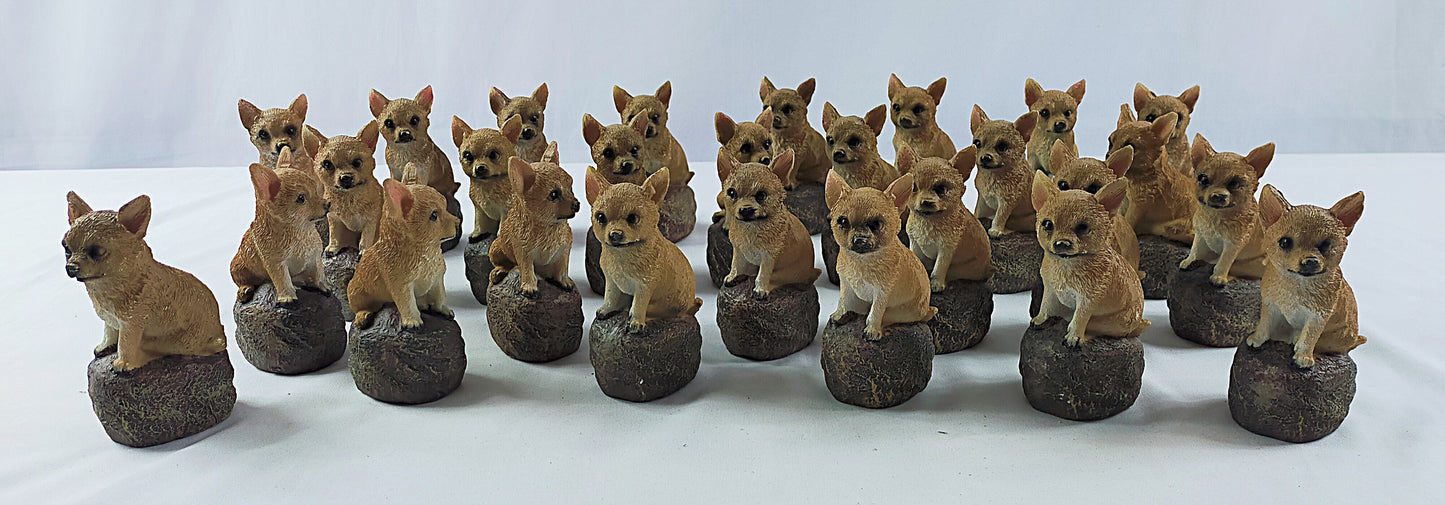 Lot de 27 statues chien sur un rocher ( 0.50 cts / pcs )