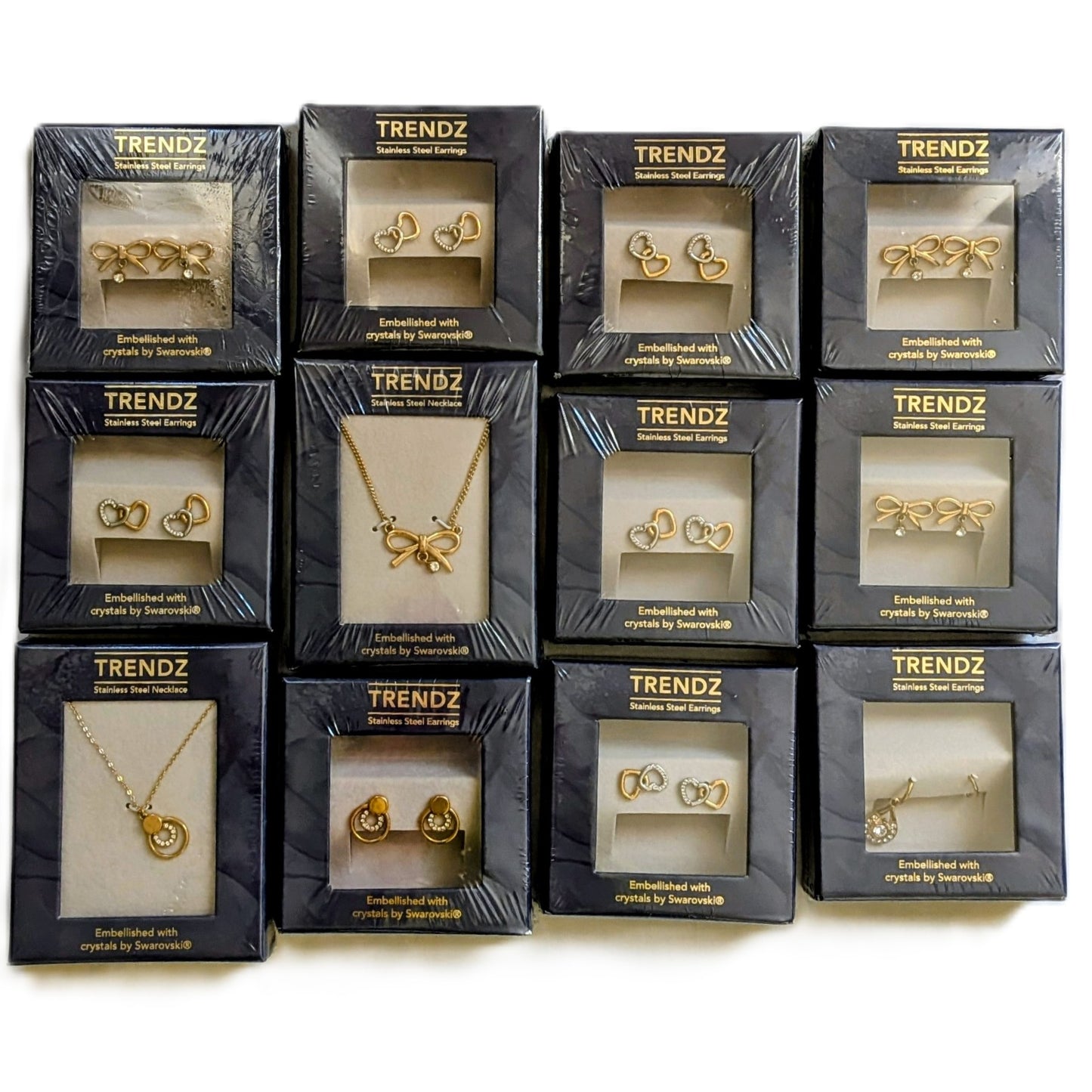 12 Coffrets Boucles oreilles et colliers plaqué or et cristaux Swarovski