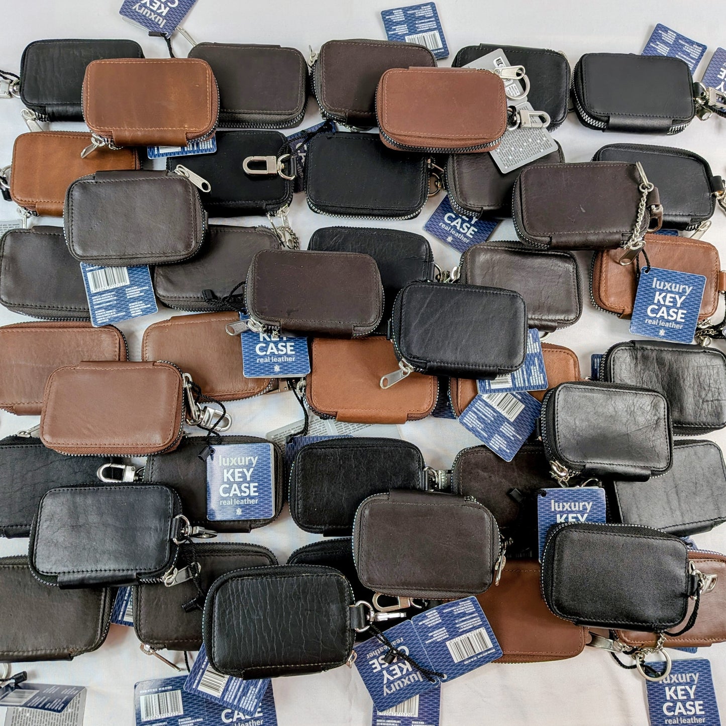 42 Pochettes / Portes-clés / Portes Monnaies en cuir de vache