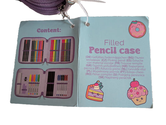 Coffret en cuir rose pour dessinateur futé remplie de crayons, feutre, règle...